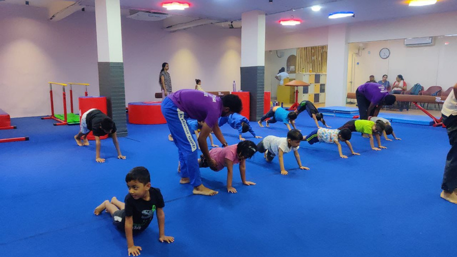 Children taking part in a coached movement session at Little Ninja Gym